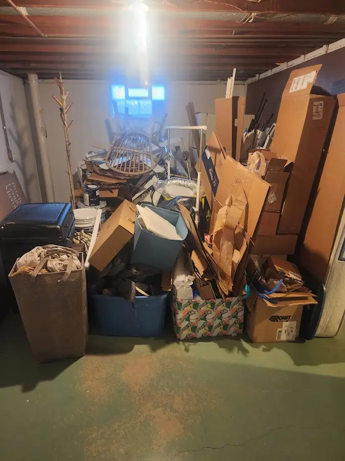 Roll-off dumpster container at job site for Concrete Dumpster Rental in Sheridan